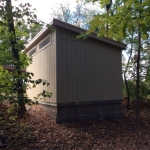 Retaining wall built to support concrete slab